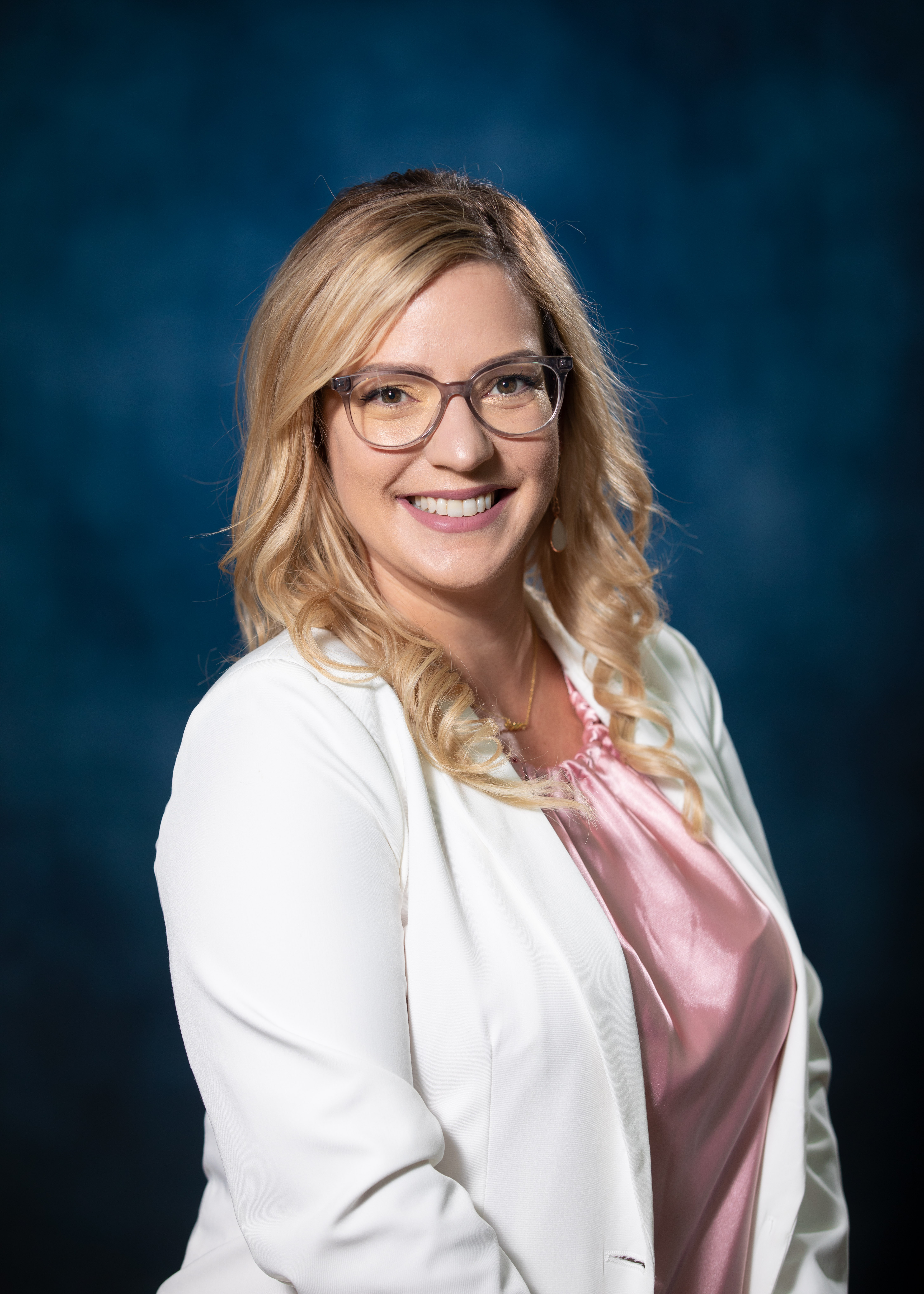 Professional headshot of Ashley, founder of Savvy Pathways