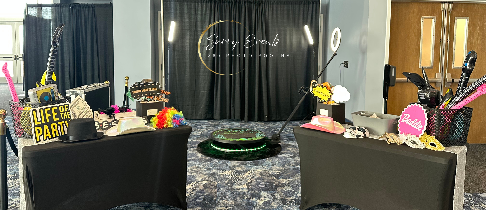 Savvy Events 360 photo booth at an event with props